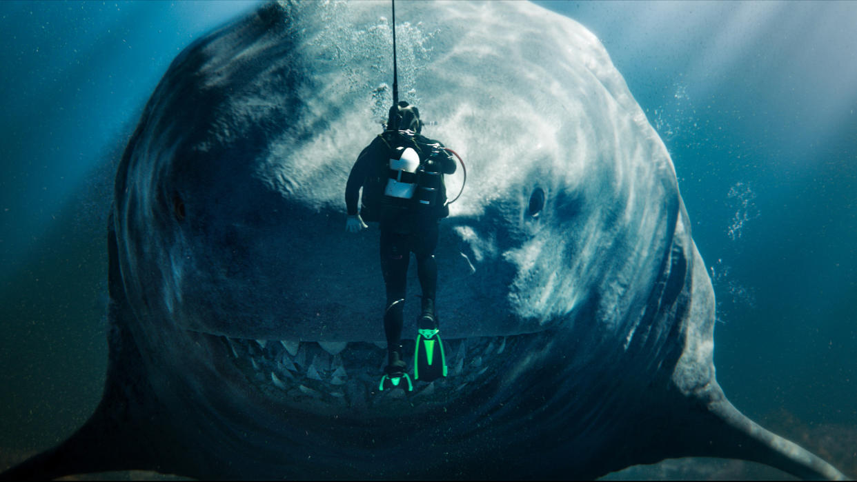  A diver comes face to face with a megalodon in The Meg 2: The Trench. 