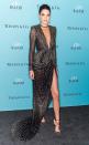 <p>Kendall Jenner wears a plunging gown by Redemption at Harper's BAZAAR 150th Anniversary Event</p>