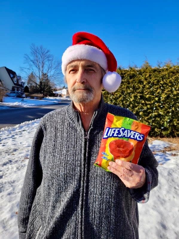 Mel Cambpell holds at bag of LifeSavers, the best alternative he's found to the LifeSaver Sweet Storybook he's handed out to his children and grandchildren for more than 40 years.