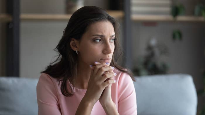 A woman deep in thought