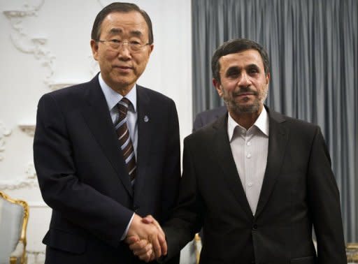 Iranian President Mahmoud Ahmadinejad (right) and UN Secretary General Ban Ki-Moon shake hands at the Iranian President's office in Tehran on August 29. Ban on Wednesday held talks with Iran's leaders on its nuclear activities, the Syria conflict and human rights ahead of a summit at which Tehran aims to boost its international standing