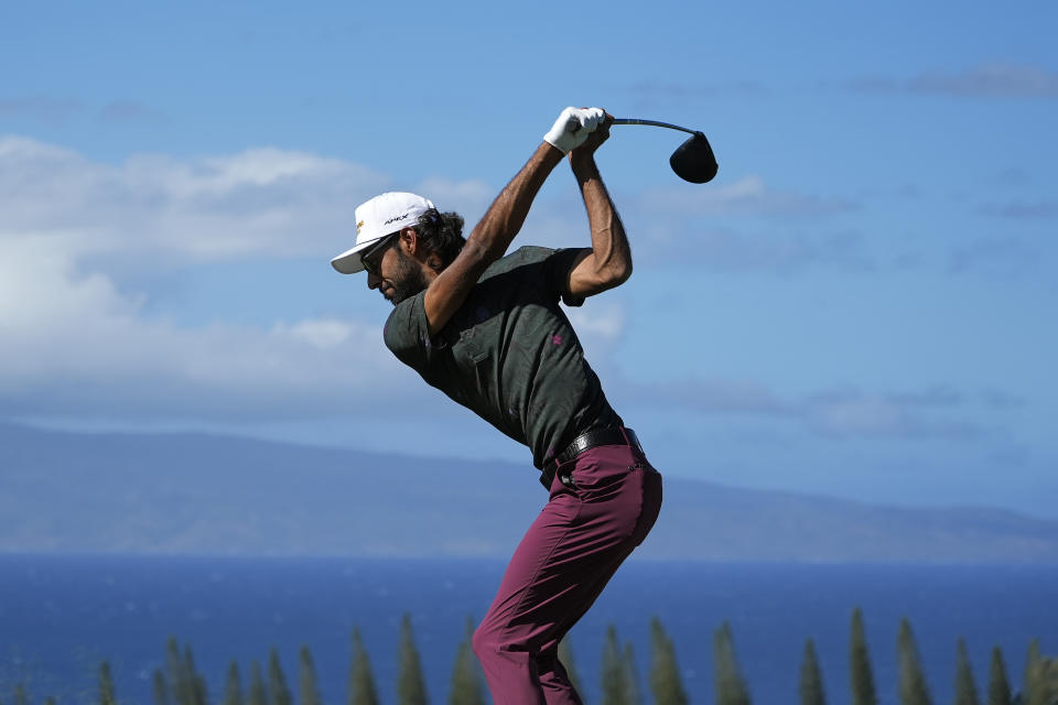 Akshay Bhatia hits from the 18th tee during the third round of The Sentry golf event, Saturday, Jan. 6, 2024, at Kapalua Plantation Course in Kapalua, Hawaii. (AP Photo/Matt York)