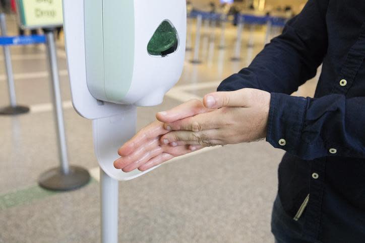 Public hand sanitizer station: Getty Images/iStockphoto