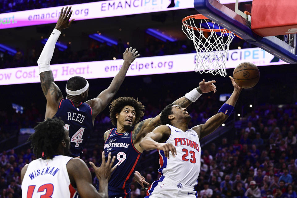 Philadelphia 76ers' Kelly Oubre Jr. (9) blocks a shot by Detroit Pistons' Jaden Ivey (23) during the second half of an NBA basketball game, Tuesday, April 9, 2024, in Philadelphia. (AP Photo/Derik Hamilton)