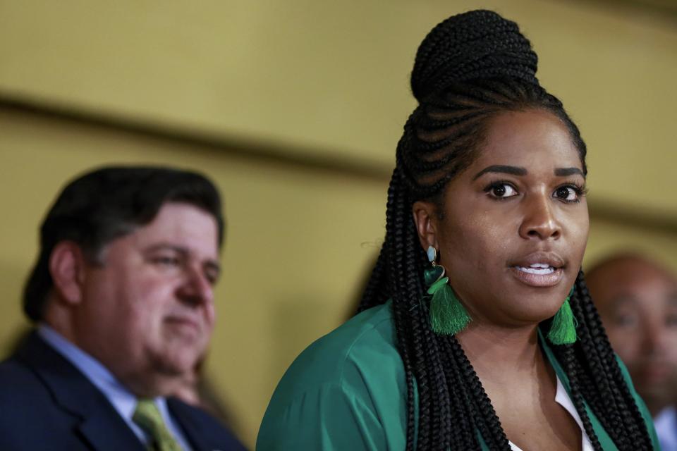 Rep. Jehan Gordon-Booth, D-Peoria speaks during a news conference before Gov. J. B. Pritzker signs a bill that legalizes adult-use cannabis in the state of Illinois at Sankofa Cultural Arts and Business Center, Tuesday, June 25, 2019, in Chicago. (AP Photo/Amr Alfiky)