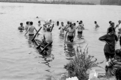 Festival goers take a dip at the 1969 Woodstock music festival, considered by many a pivotal moment for rock music and 1960s counterculture