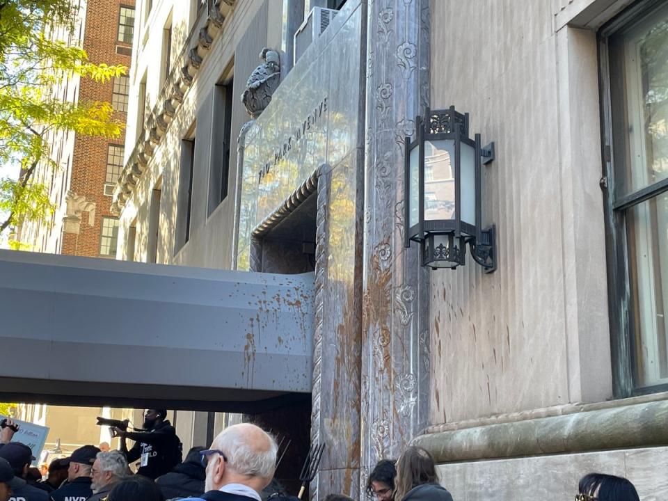 Tomato soup was thrown onto the building in protest (Ethan Freedman/The Independent)