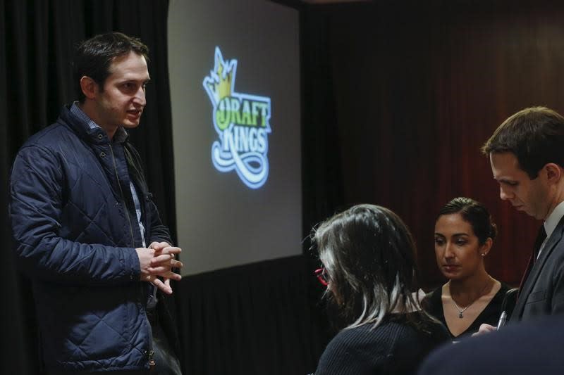 DraftKings CEO Jason Robins speaks to the press at a fantasy sports conference in 2015. (Reuters)