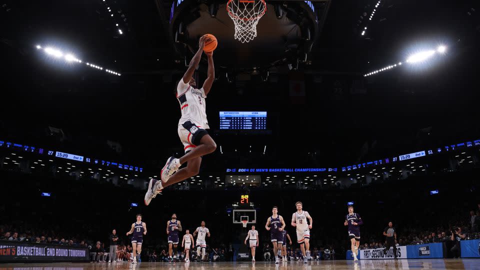 Newton scores a basket on a fast break during the second half against the Northwestern Wildcats in the second round of March Madness. - Sarah Stier/Getty Images