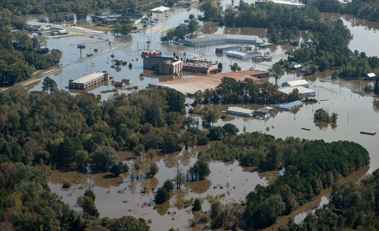 Flood waters from the Neuse River inundate Kinston on Sunday in October 2016 in the wake of Hurricane Matthew. Environmentalists fear the loss of protections for isolated wetlands could make flooding in Eastern NC worse.