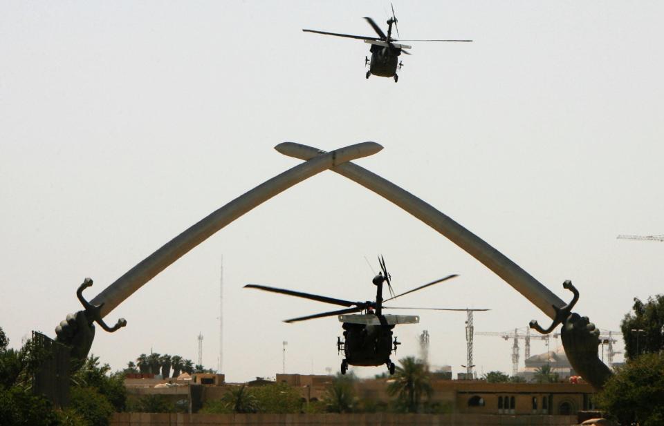 Black Hawk helicopters take off from Baghdad's Green Zone