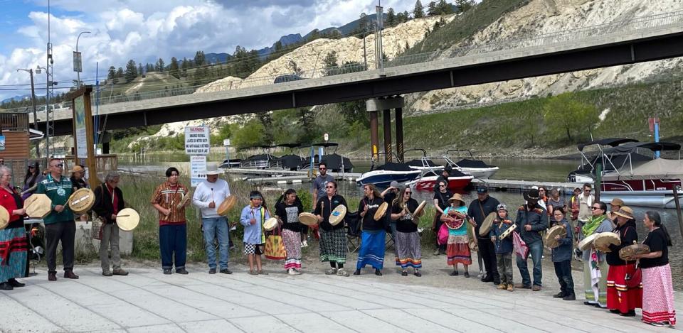 Members of the Secwépemc, Ktunaxa and Syilx Okanagan Nations gather for a Tri-Nation ceremonial salmon fry release hosted by the Shuswap Band, with salmon fry contributed by the Okanagan Nation Alliance hatchery in Invermere, B.C., on May 24, 2024.