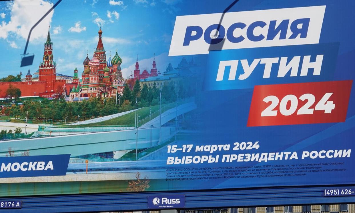 <span>A campaign poster for Russian president and presidential candidate Vladimir Putin in Moscow, seen on 13 March.</span><span>Photograph: Maxim Shipenkov/EPA</span>