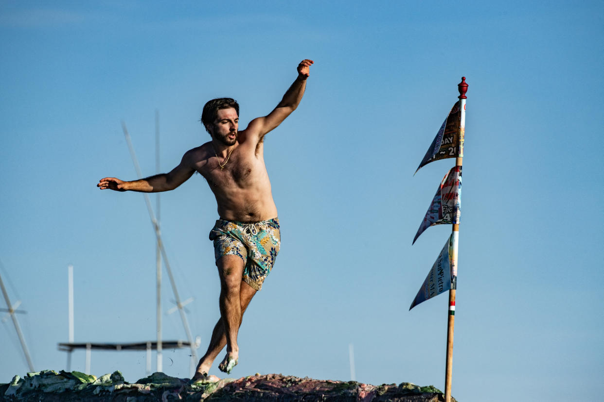 This year’s Friday winner, Max Allen, moments before grabbing the flag. (Joseph Prezioso/AFP via Getty Images)