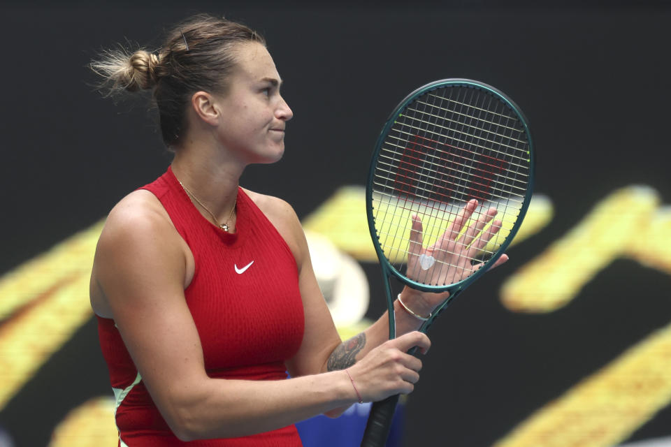 Aryna Sabalenka of Belarus celebrates after defeating Lesia Tsurenko of Ukraine in their third round match at the Australian Open tennis championships at Melbourne Park, Melbourne, Australia, Friday, Jan. 19, 2024. (AP Photo/Asanka Brendon Ratnayake)