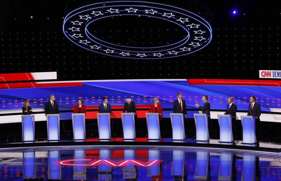 Democratic candidates appear during a primary debate in Detroit last month. (AP Photo/Paul Sancya)