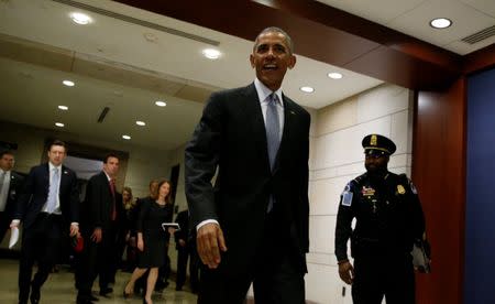 U.S. President Barack Obama leaves after his meeting with House and Senate Democrats to discuss a strategy on congressional Republicans' efforts to repeal the Affordable Care Act in the U.S. Capitol in Washington, DC, U.S. January 4, 2017. REUTERS/Kevin Lamarque