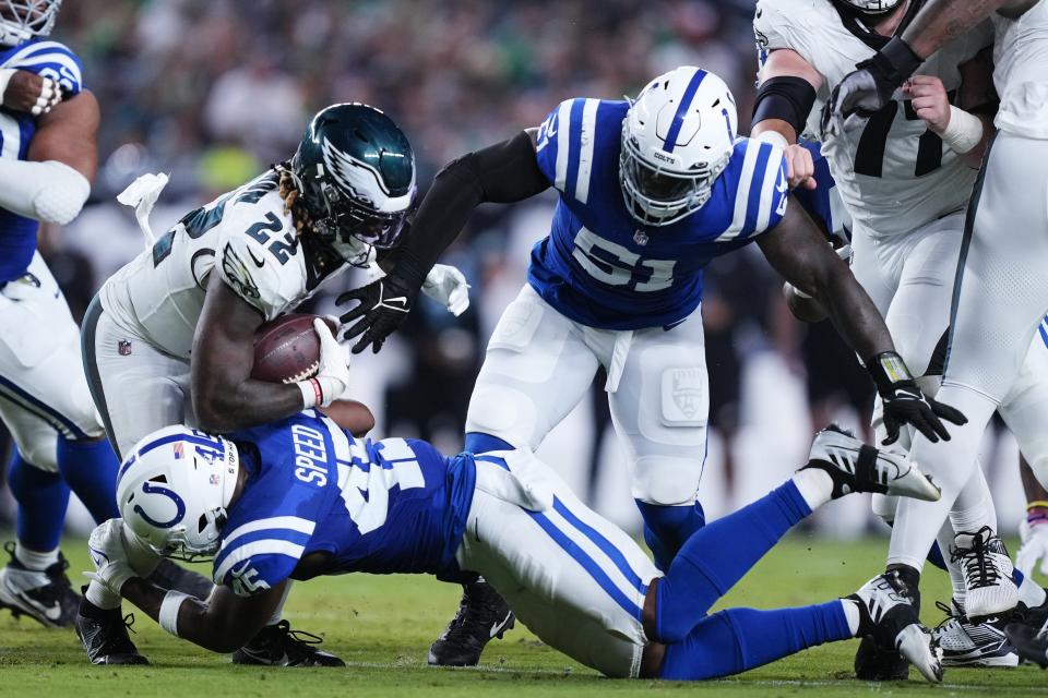 Philadelphia Eagles running back Trey Sermon (22) is stopped by Indianapolis Colts linebacker E.J. Speed (45) during the first half of an NFL preseason football game Thursday, Aug. 24, 2023, in Philadelphia. (AP Photo/Matt Rourke)