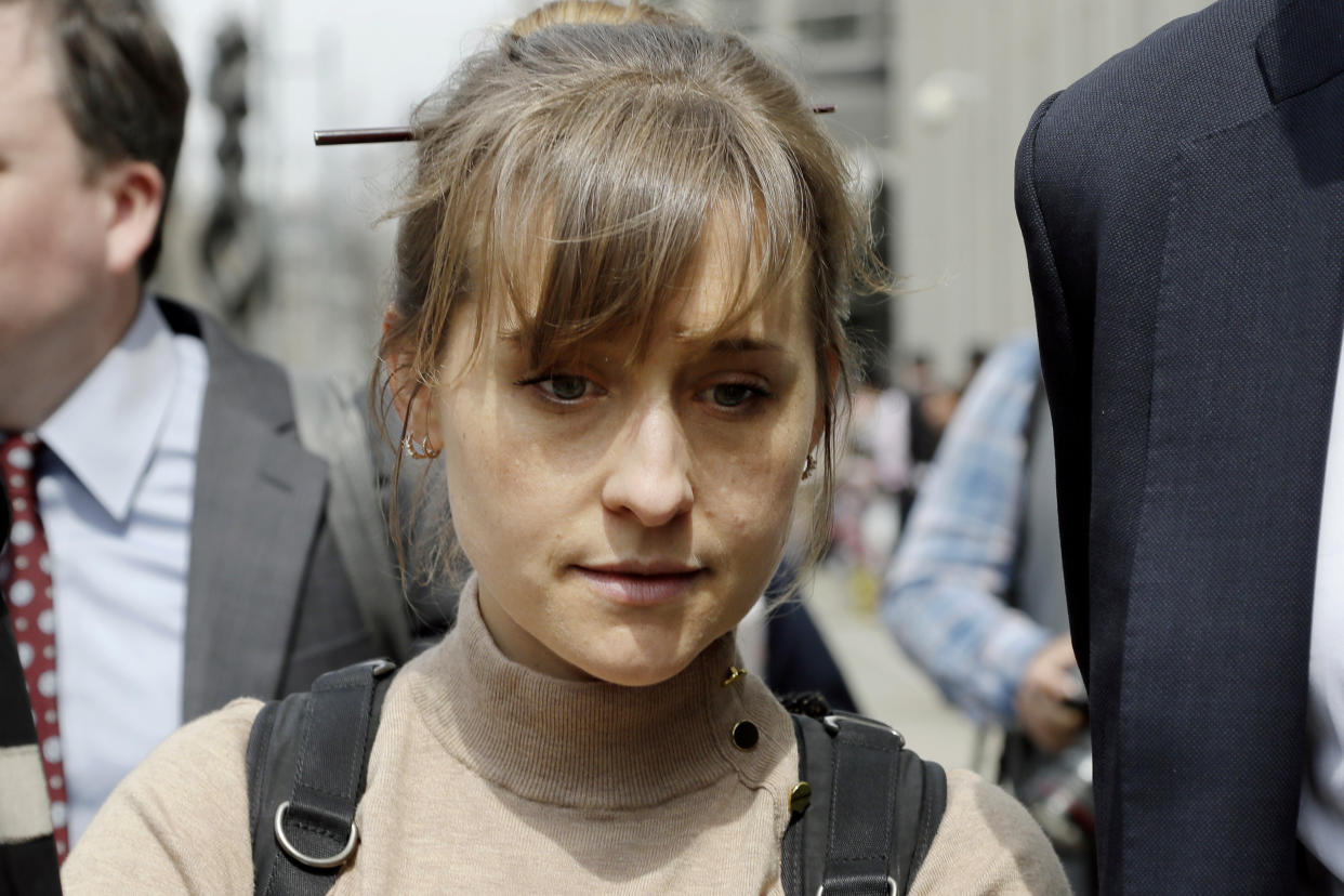 Allison Mack leaves Brooklyn federal court Monday, April 8, 2019, in New York, after pleading guilty to racketeering charges. (Mark Lennihan/AP)