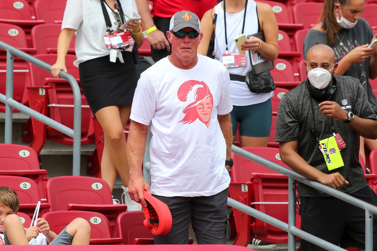 TAMPA, FL - SEP 20: Pro Football Hall of Famer Brett Favre shows his support by wearing the Tom Brady version of the Bucco Bruce vintage Bucs t-shirt before the regular season game between the Carolina Panthers and the Tampa Bay Buccaneers on September 20, 2020 at Raymond James Stadium in Tampa, Florida. (Photo by Cliff Welch/Icon Sportswire via Getty Images)