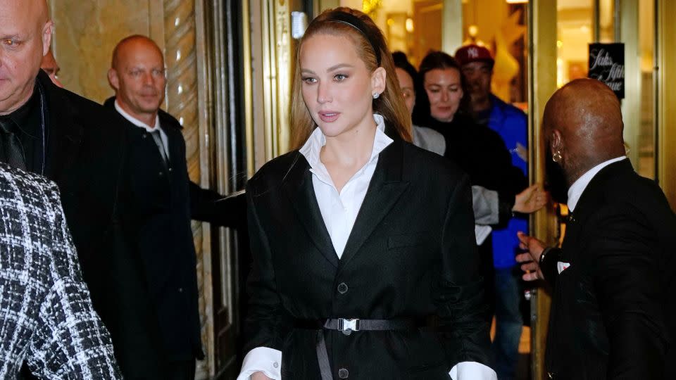 On Monday, Jennifer Lawrence attended the Saks Fifth Avenue x Christian Dior holiday display unveiling. Her belted Dior jacket made headlines after it unbuckled mid-speech. - Gotham/GC Images/Getty Images