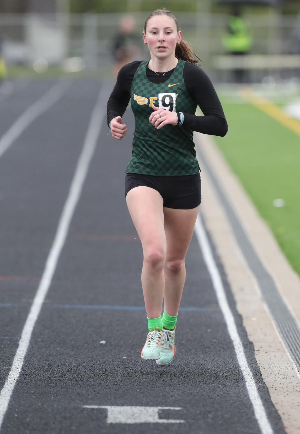 Sarah Schueler of Firestone wins the 3,200 meters in the City Series track and field championship meet, Saturday, May 11, 2024, at Ellet High School.