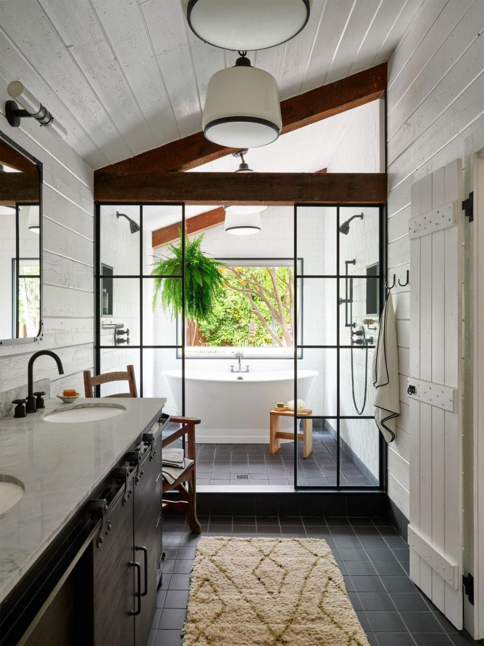 a bathroom with a glass door