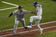 Tampa Bay Rays first baseman Ji-Man Choi tags out Los Angeles Dodgers' Austin Barnes during the third inning in Game 6 of the baseball World Series Tuesday, Oct. 27, 2020, in Arlington, Texas. (AP Photo/Sue Ogrocki)