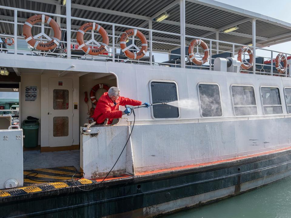  Specialized operators disinfect a public vaporetto in the depot of the Venetian transport company on February 26, 2020 in Venice, Italy.