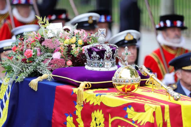 PHOTO: The coffin of Queen Elizabeth II with the Imperial State Crown, orb and sceptre resting on top is carried into Westminster Abbey on Sept. 19, 2022 in London. (Chris Jackson/Getty Images)