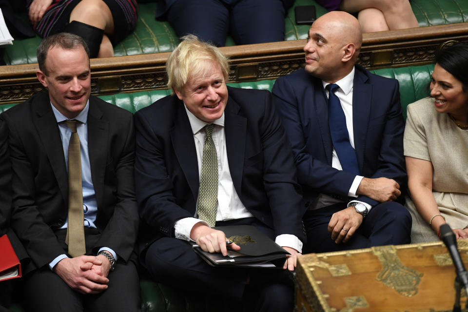 Britain's Prime Minister Boris Johnson and Chancellor of the Exchequer Sajid Javid attend the debate on the Queen's Speech in the House of Commons Chamber, in London, Britain December 19, 2019. ©UK Parliament/Jessica Taylor/Handout via REUTERS THIS IMAGE HAS BEEN SUPPLIED BY A THIRD PARTY.