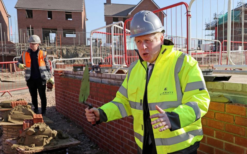 Boris Johnson visits a residential housing development in Stonehouse, southwest England - AFP