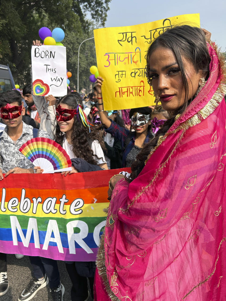 A participant of the Delhi Queer Pride Parade poses for a photograph during the march in New Delhi, India, Sunday, Nov. 26, 2023. This annual event comes as India's top court refused to legalize same-sex marriages in an October ruling that disappointed campaigners for LGBTQ+ rights in the world's most populous country. (AP Photo/Shonal Ganguly)