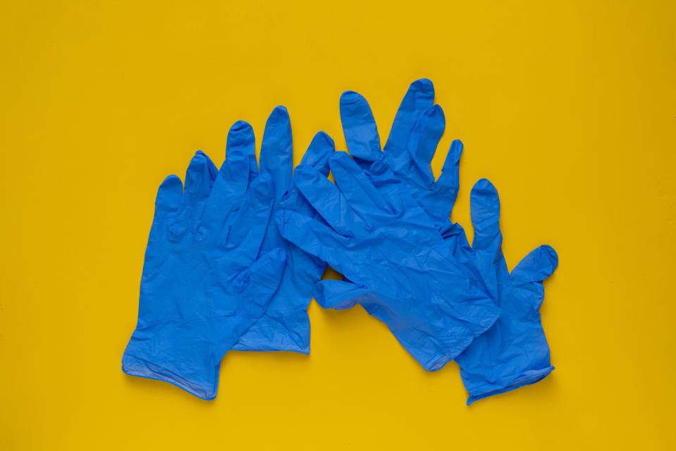 During the coronavirus pandemic, even sanitizing gloves may not be helpful for stopping the spread of germs. (Михаил Руденко via Getty Images)