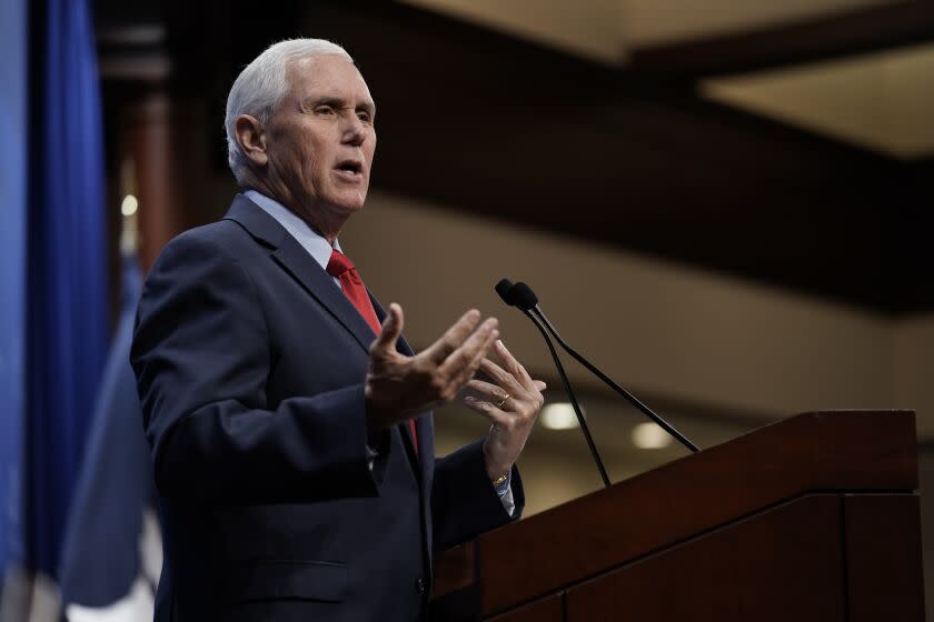 Former Vice President Mike Pence speaks at the Heritage Foundation, a conservative think tank, in Washington, Wednesday, Oct. 19, 2022. Pence has been traveling the country, holding events and raising millions for candidates and Republican groups, including signing fundraising solicitations for party committees. (AP Photo/J. Scott Applewhite)