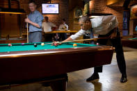 <p>“The President whistles along to Van Morrison’s ‘Brown-Eyed Girl’ while shooting pool with Colorado Gov. John Hickenlooper in Denver, Colorado on July 8, 2014. The President took great pride in beating the Governor at the bar the Governor founded.” (Pete Souza/The White House) </p>