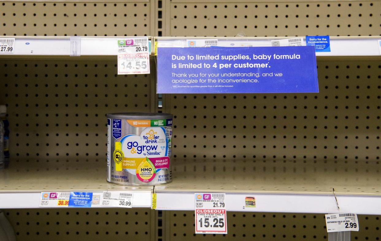 A sign explains to customers why they are limited to four baby formula products per visit at Kroger on Thursday, May 19, 2022.