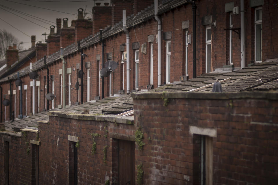 BOLTON, UNITED KINGDOM - FEBRUARY 09:  A general view of terraced houses and the back alleys of homes in Bolton on February 9, 2015 in Bolton, United Kingdom. As the United Kingdom prepares to vote in the May 7th general election  many people are debating some of the many key issues that they face in their life, employment, the NHS, housing, benefits, education, immigration, 'the North South divide, austerity, EU membership and the environment.  (Photo by Christopher Furlong/Getty Images)