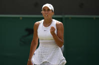 Madison Keys of the US celebrates after winning a point against Russia's Mirra Andreeva in a women's singles match on day eight of the Wimbledon tennis championships in London, Monday, July 10, 2023. (AP Photo/Alastair Grant)