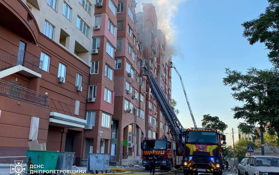 The ruins of the top floors of an apartment building in Dnipro hit by a Russian missile strike on June 28