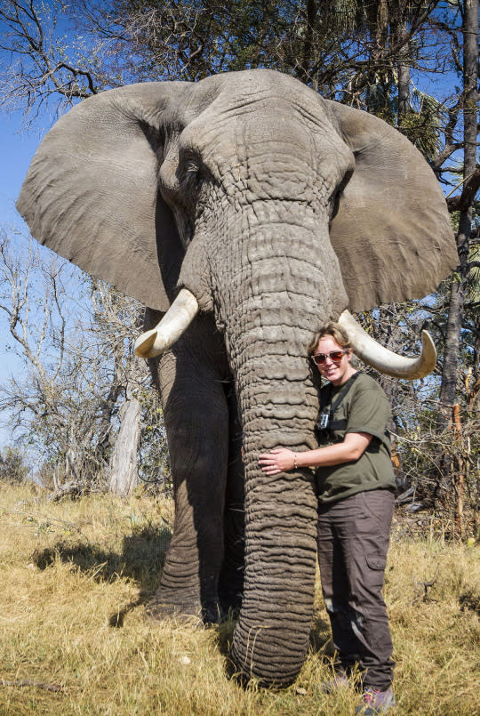 <p>Photographer Bobby Jo Clow poses with an elephant. (Bobby-Jo Clow/Caters News Agency) </p>