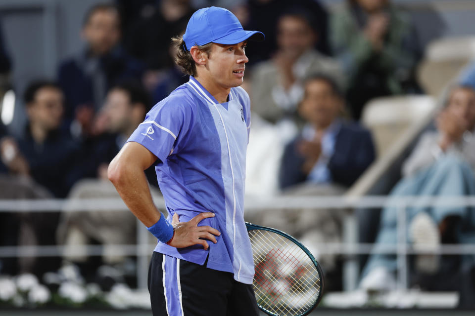 Australia's Alex De Minaur reacts after missing a shot against Germany's Alexander Zverev during their quarterfinal match of the French Open tennis tournament at the Roland Garros stadium in Paris, Wednesday, June 5, 2024. (AP Photo/Jean-Francois Badias)