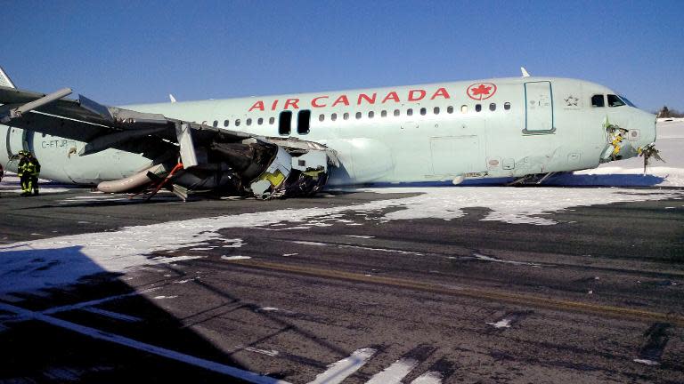 Handout photo by the Canada Transportation Safety Board shows damage to an Air Canada Airbus A-320 that skidded off the runway at Halifax International Airport in Halifax, Nova Scotia, March 29, 2015