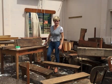 Australian Foreign Minister Julie Bishop surveys the damage caused by Cyclone Winston at the Penang Sangam primary school in the Fijian village of Rakiraki, March 14, 2016. REUTERS/Rashida Yosufzai/AAP