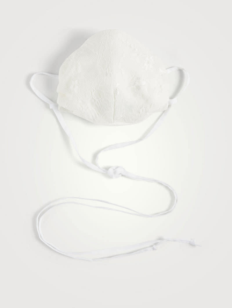 UNTTLD Lace Face Mask in white. Image via Holt Renfrew.