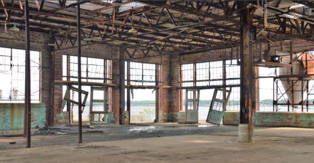 The old Ford Motor Company automobile assembly plant was built on the waterfront in 1924. Jacksonville City Council authorized demolition of the building because rebuilding the bulkhead in that part of the river will cause the building to collapse, according to the building's owner.