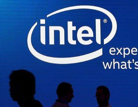 Shadows are cast near the Intel logo at the 2015 Computex exhibition in Taipei, Taiwan, June 3, 2015. REUTERS/Pichi Chuang