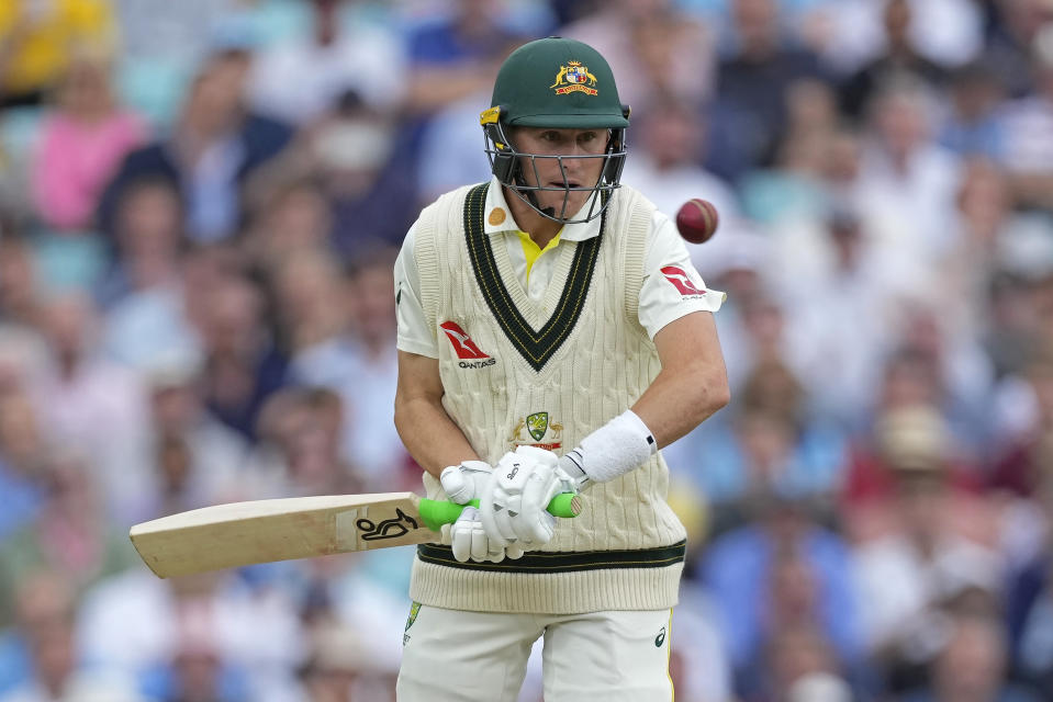 Australia's Marnus Labuschagne attempts to play a rising delivery during the second day of the fifth Ashes Test match between England and Australia at The Oval cricket ground in London, Friday, July 28, 2023. (AP Photo/Kirsty Wigglesworth)