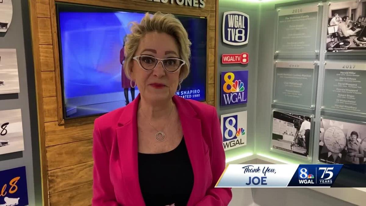 Former anchor Kim Lemon congratulates Joe Calhoun on retirement