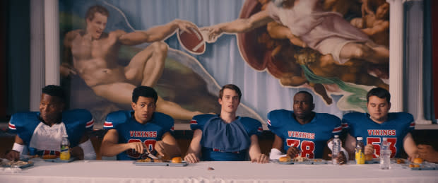 Tom (Miles Fowler, second from left) and Jeff (Nicholas Galitzine, center), plus other football players, lord over the school cafeteria.<p>Photo: Courtesy of Orion Pictures Inc.</p>